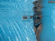 Latina petite average babe Lia nude in pool 2/16