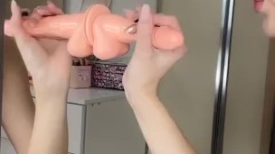 Dildo blowjob on mirror