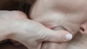 Young wife makes a gentle blowjob and takes cum in her mouth and on her face