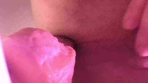 A sissy and a dildo.