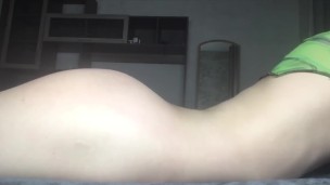 young cute gay boy plays with his ass while no one is home