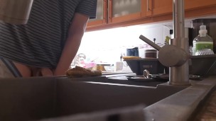 Morning piss into the kitchen sink
