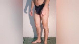 The guy shows what a chastity belt looks like in his underpants - a chastity cage in his thong