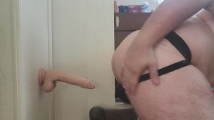 Riding a dildo
