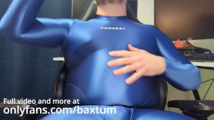 Gainer in shiny Amorsey suit chugging eggnog