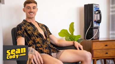 SEAN CODY - Phoenix Sheds His Clothes And Strokes His Long Curved Cock Until He Cums On The Bed