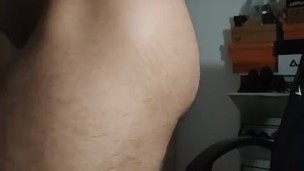 Young bodybuilder flexes thighs and jerk thick cock