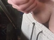 Cock jerking in a cold workshop