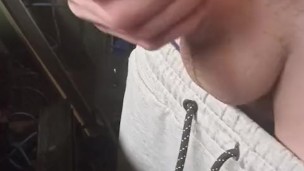 Cock jerking in a cold workshop