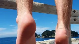 Fit Soccer Player Showing off Feet and Calves in Public Bath