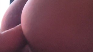 Anal maid cleaning a dildo with her ass