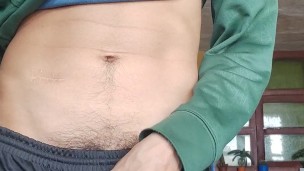 MASTURBATING his cock in front of the window