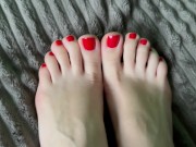 shows off her sexy feet and massages them 4/16