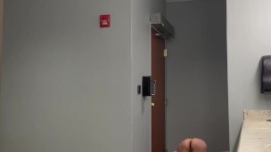 Slave crawling nose to floor in public bathroom