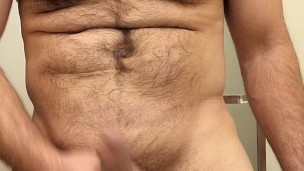 HAIRY MUSCLE BEAR STROKING COCK BEFORE SHOWER