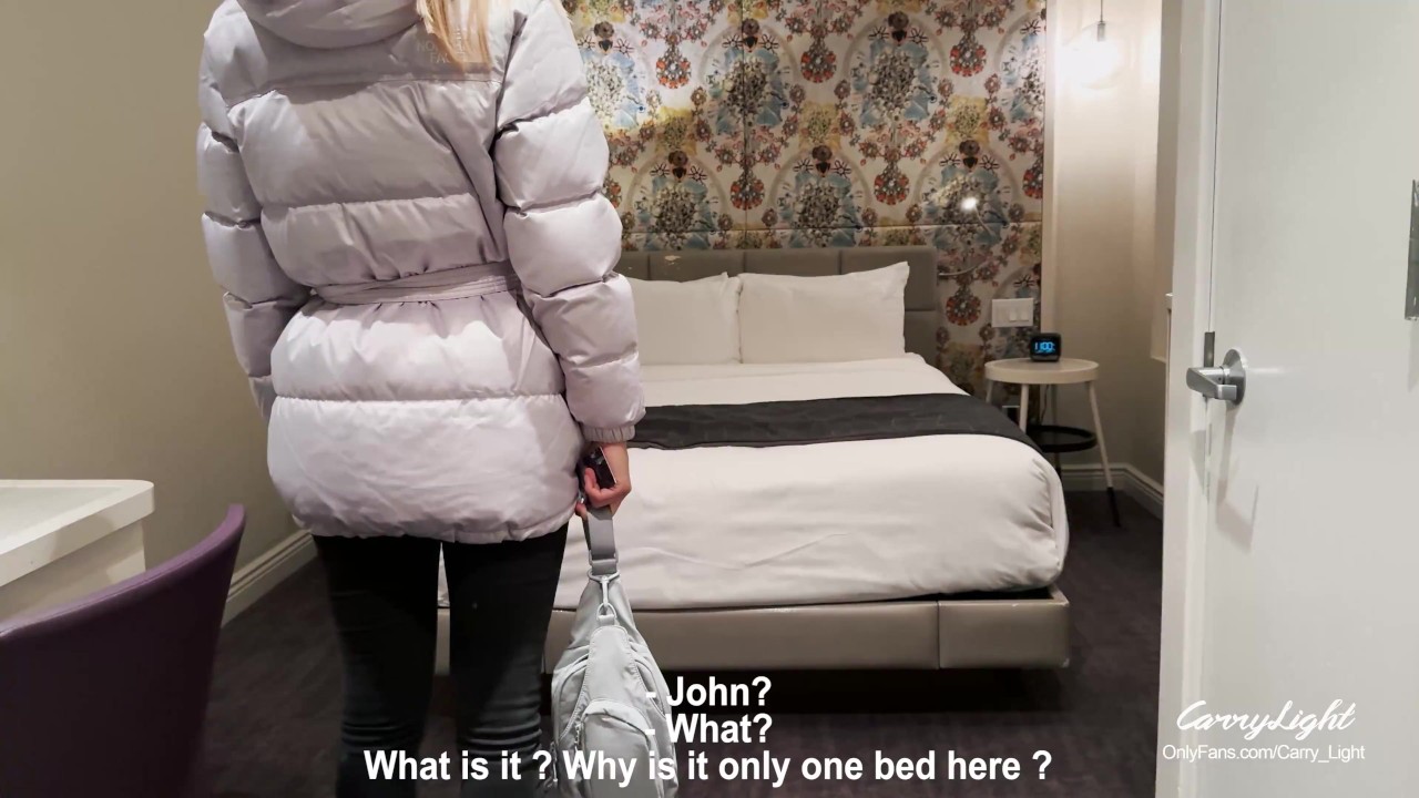 Stepmother and stepson share a bed in a hotel room