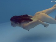 Very small teen in red swimming and posing 16/16