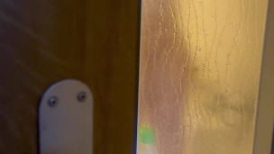 Exhibitionist wife's shower before New Year's Eve. Hot milf caught playing with her dildo.