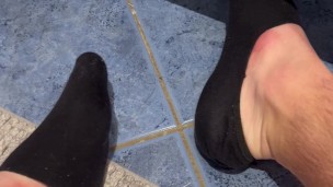 Playing with my black socks in bathroom