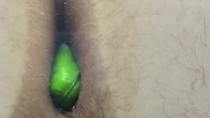 Pressing green into my hole against the glass