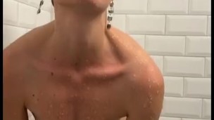 Hot MILF takes a shower and jerks her pussy hard