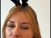 Hot MILF in a bunny costume gives blowjob to a huge dildo 15/16