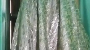 Indian Gay Crossdresser Gaurisissy in Pink lehanga pressing his Boobs and fingering in his ass