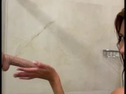MILF with a perfect body takes a shower and gives a blowjob to a big dildo 1/16