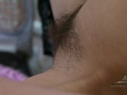 Cute petite girl enjoys preparing for a hot evening, including playing with her thick lush pubes. 11/16