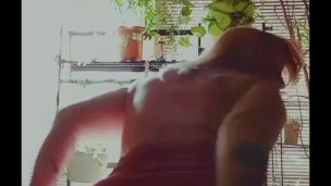 Seductive house wife in window