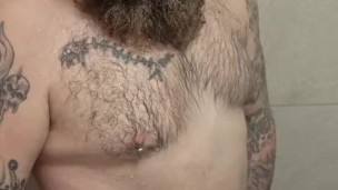 Chubby Scottish Bear in the shower.