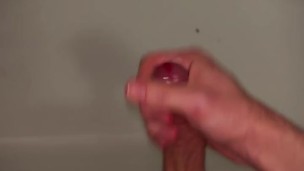jerking off a juicy dick in the bathroom