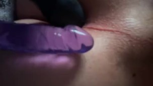 Femboy slut fucks his right hole with toy