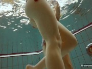 Milana and Alice enjoy themselves in the pool 5/16