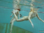 Milana and Alice enjoy themselves in the pool 9/16