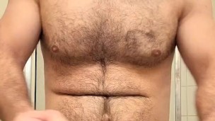 HAIRY MUSCLE BEAR FLEXING BEFORE HOT SHOWER!