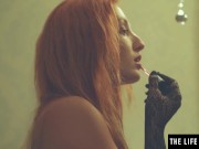 Watch this redhead go face down ass up to ride her gloved hands 3/16