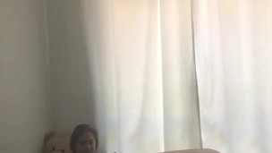 two latinas fingering their beautiful pussies watching lesbian porn.