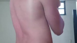 Handsome naked guy needs help applying aloe to his beautiful body