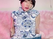 Fit cutie in a sexy Chinese dress plays with her wet pussy and big clit and flexes her muscles 9/16