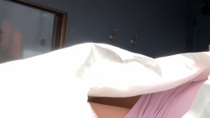 Voyeur Catches Brunette Edging Herself In Hotel Room