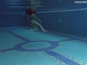 Brunette Spanish Diana Rius swimming topless 2/16