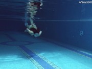 Brunette Spanish Diana Rius swimming topless 5/16