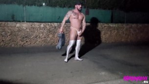 Thonged muscle man on a public street