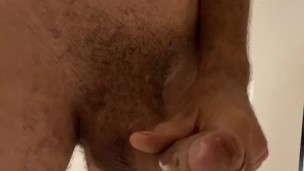 MythCurls Shoots a Huge Load in the bath before going in.