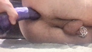 10 Inch Dildo in my ass. Chastity Cage on.