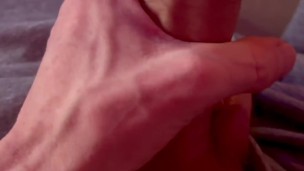 Stroking and teasing my cock with a small toy till I shoot my load