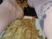 Smashing peanut butter in my Trucks pedals getting the stickiness all over (front & back view) 12/16