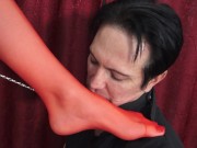 Tiffany dominates her foot slave Bobby with her red nylon feet to lick. 16/16