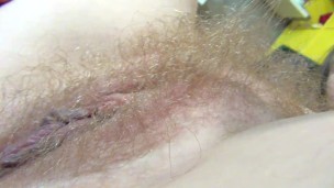 Blonde pussy hair showing in armchair